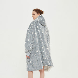 Snuggyz star glow-in-the-dark hoodie blanket, soft and cozy with star patterns, perfect for lounging and warmth during chilly nights.