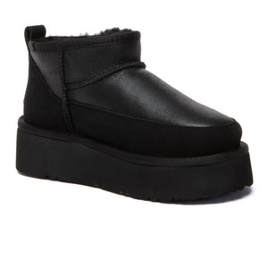 EverUgg Earlova UGG boots in tan leather with plush shearling lining and rugged rubber sole, stylish and warm footwear.