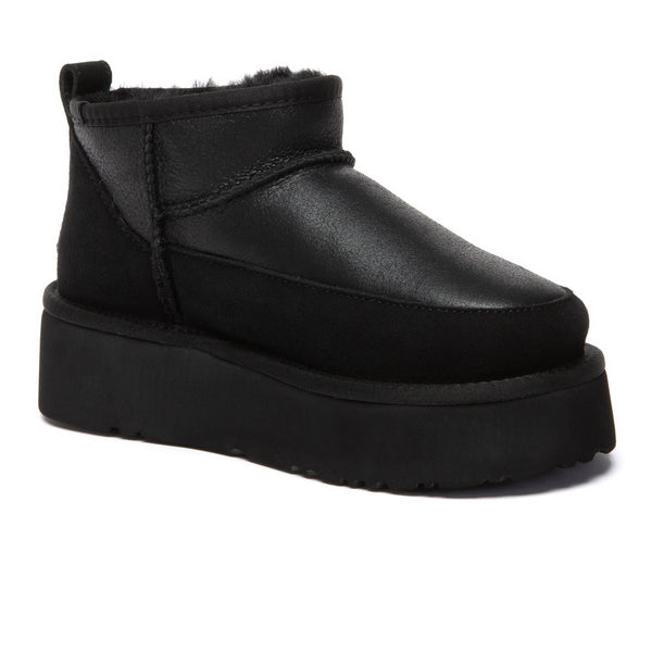 EverUgg Earlova UGG boots in tan leather with plush shearling lining and rugged rubber sole, stylish and warm footwear.