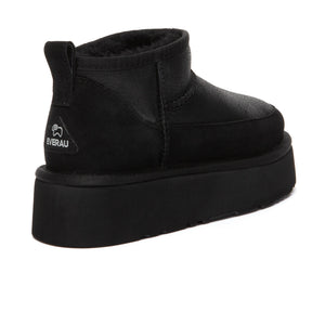 EverUgg Earlova UGG boots in plush sheepskin, tan color, with cozy sheepskin lining and classic UGG silhouette.