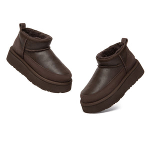 EverUgg Earlova UGG boots in classic sheepskin with a cozy slip-on design, featuring a neutral tan color and plush interior.